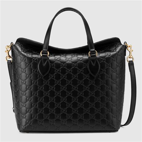 002 1072 gucci number bag black leather|gucci bag history.